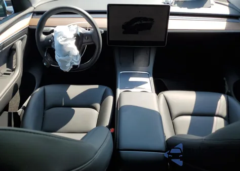 2023 Tesla Model Y from USA, damaged, VIN 7SAYGDEE6PA038113